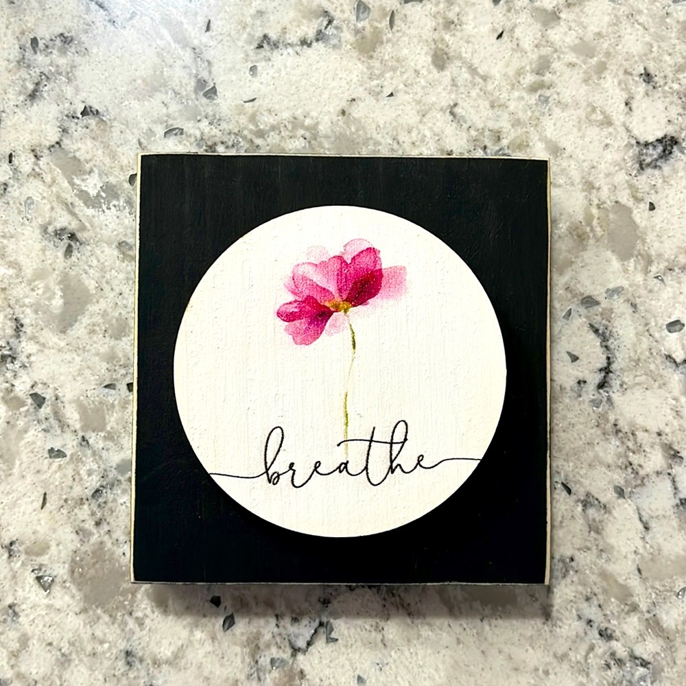 Small wooden “beautiful” sign